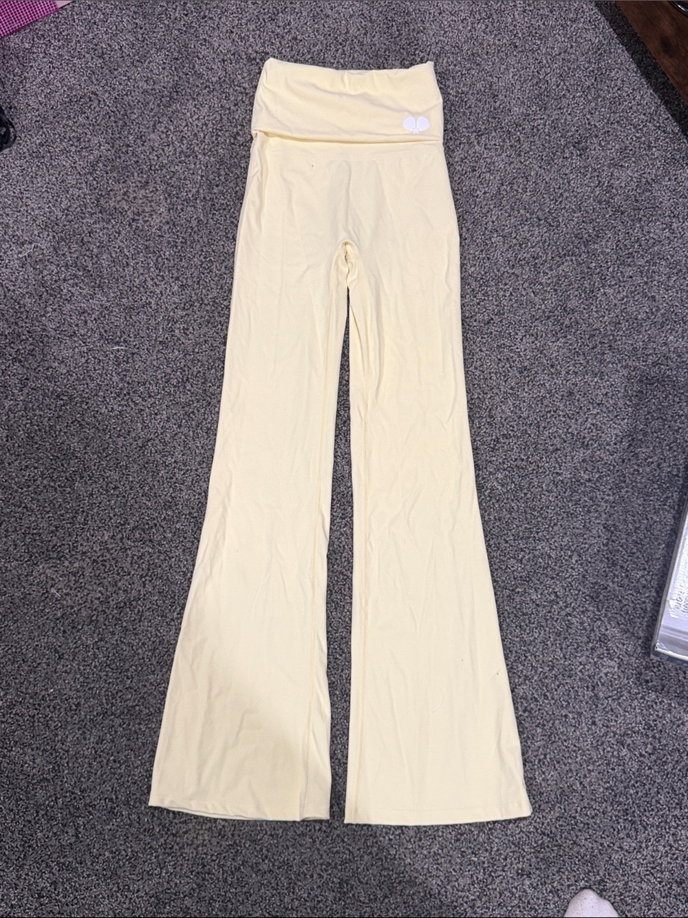 PrettyLittleThing Pale Yellow Fold-Over Waist Flare Leggings